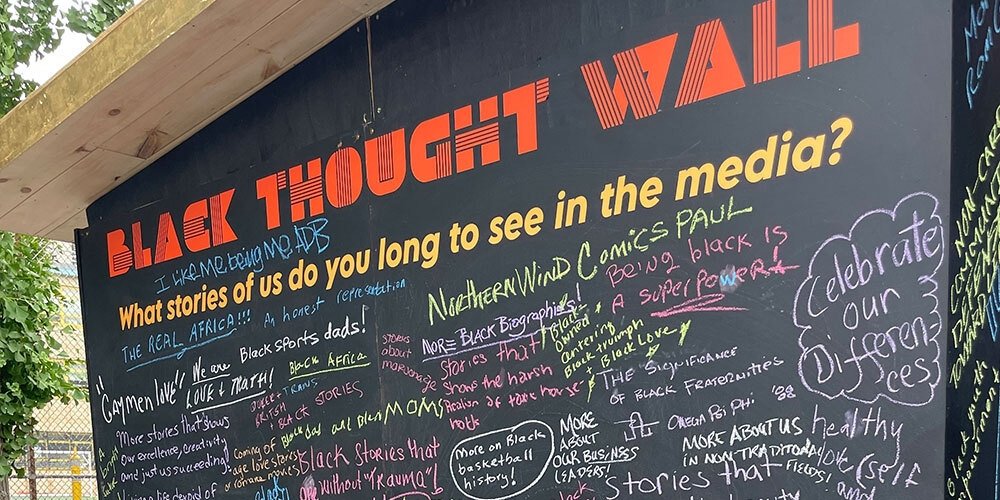 The Black Future Newsstand's Black Thought Wall features features notes and reflections from visitors.